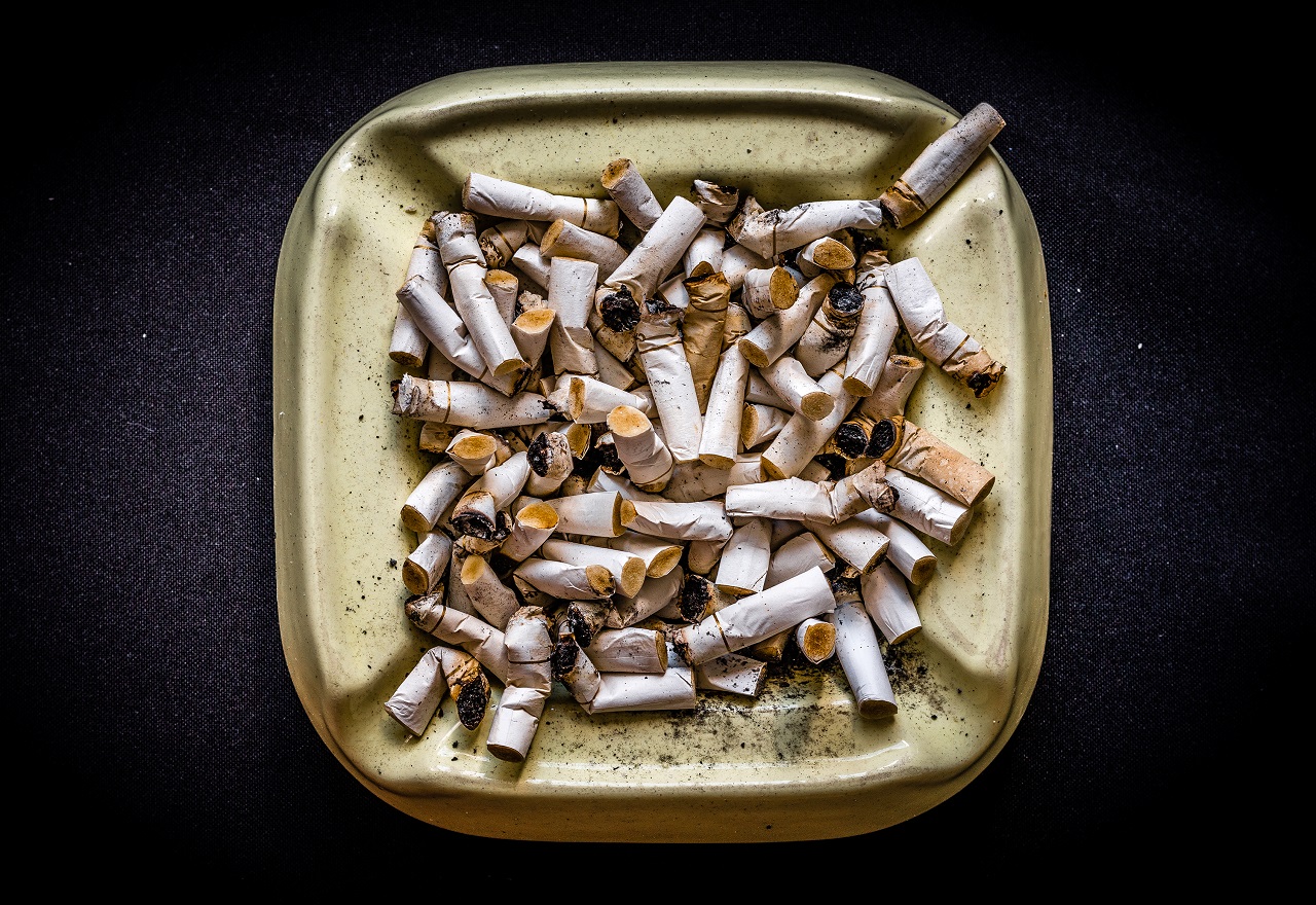 An ash tray full of used cigarettes