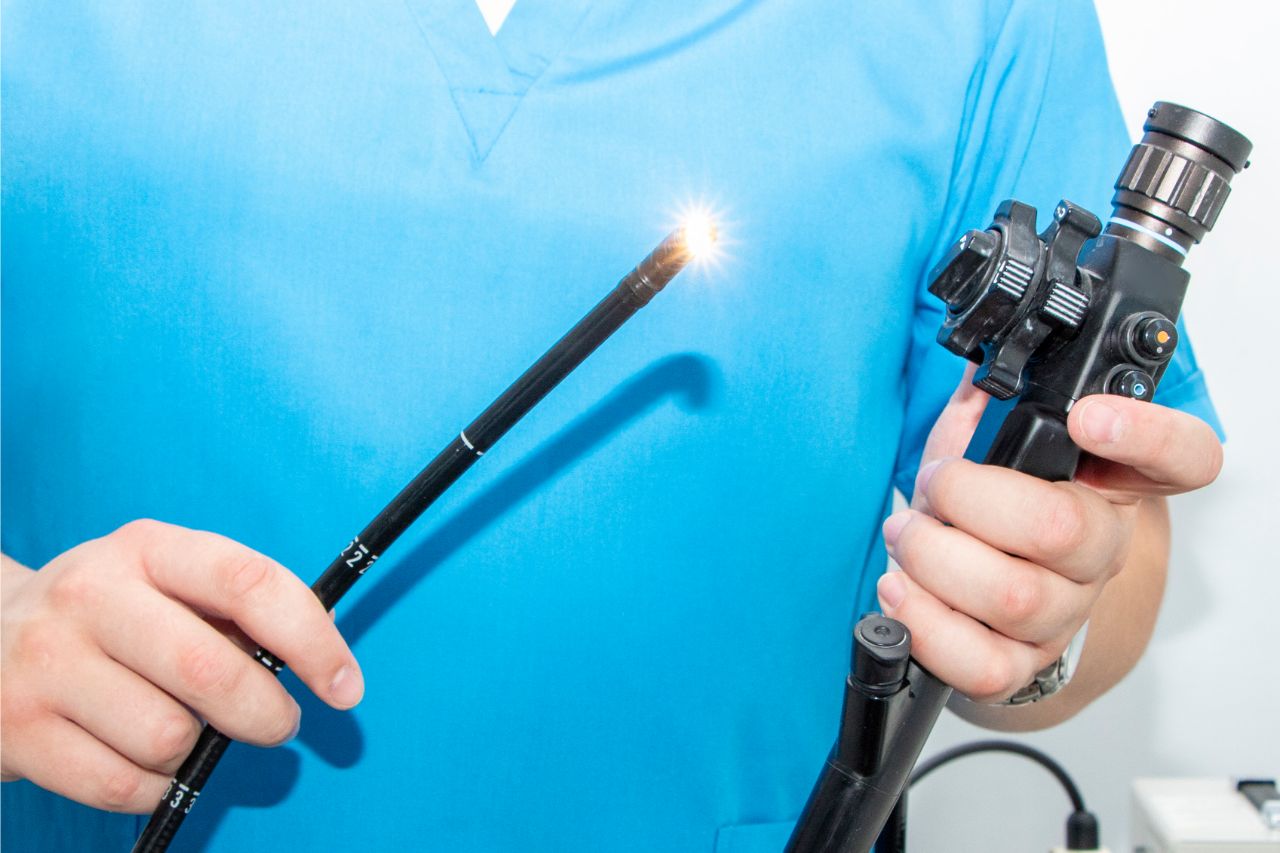 Doctor holding colonoscopy camera