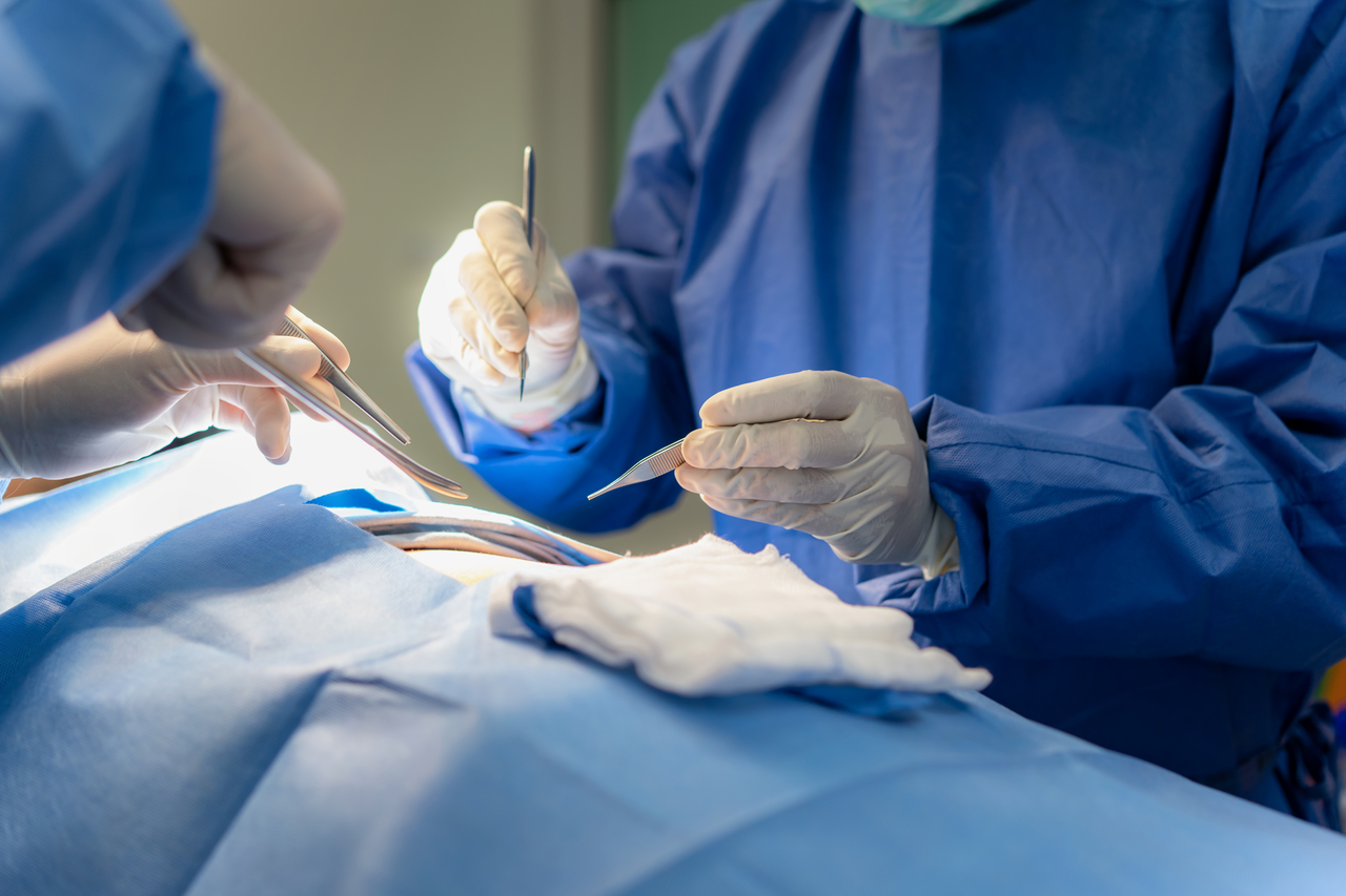Close up of a surgeon operating on a patient