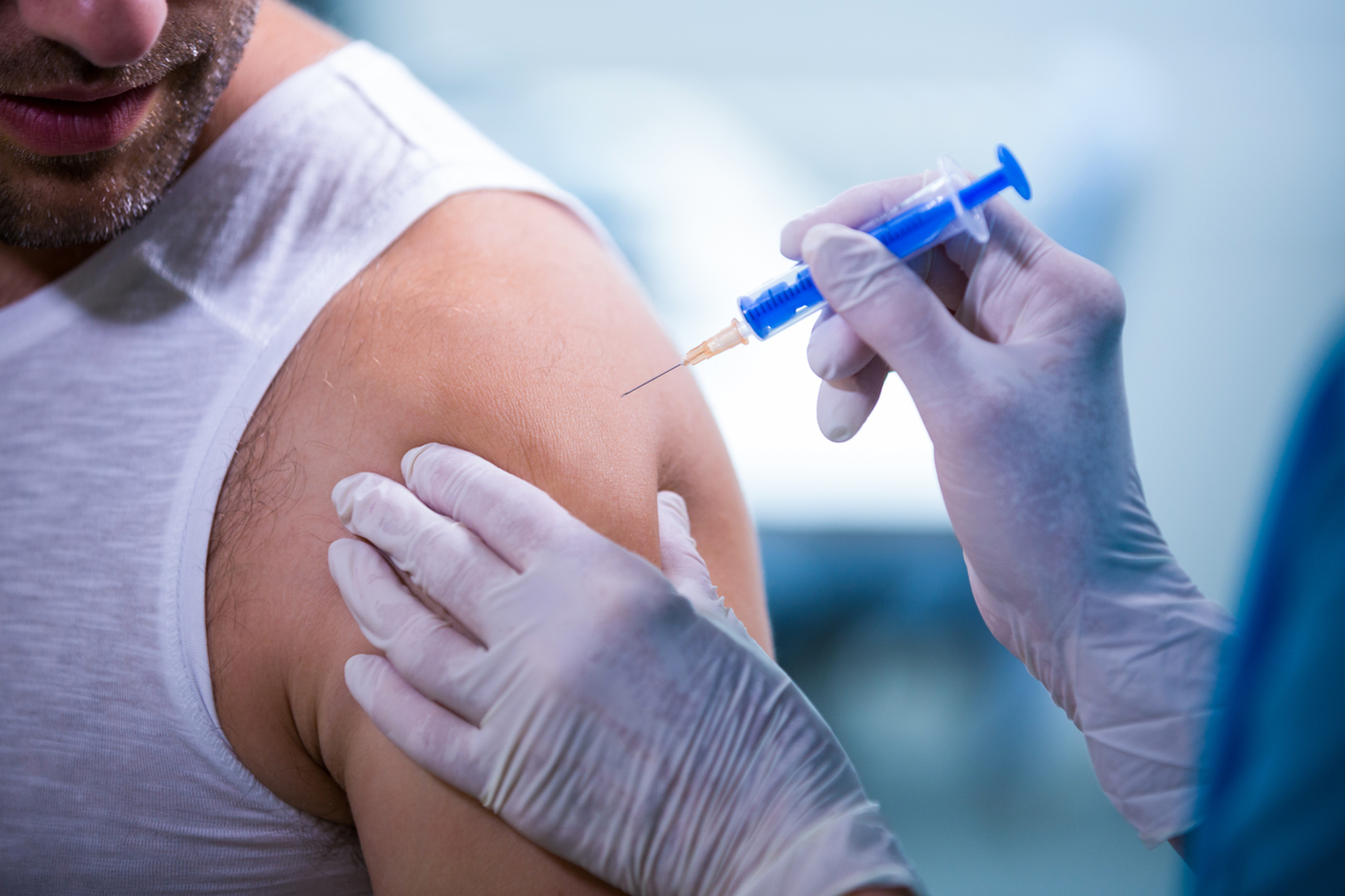 A man receiving a vaccine