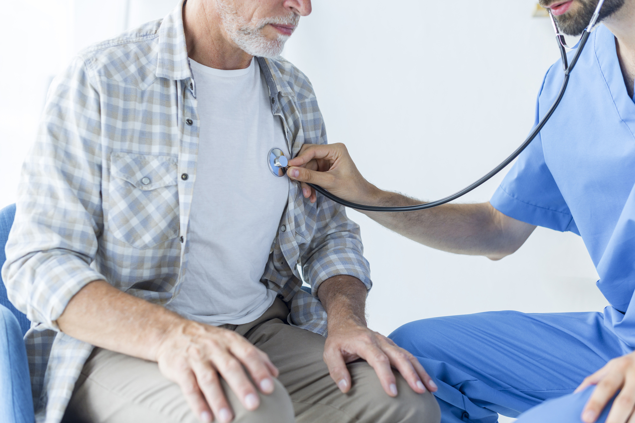 A man undergoing a physical exam